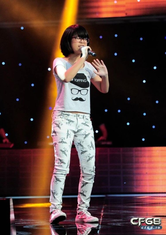 Tlinh là ai? Tổng hợp thông tin Rapper Tlinh mới nhất 2023 Tlinh biểu diễn trong cuộc thi The Voice Kids 2013