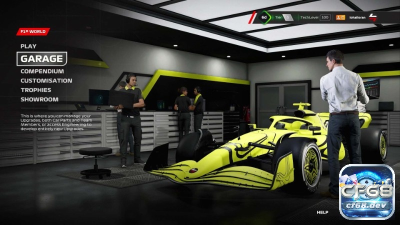 Game F1 23: Chuẩn mực mới của game đua xe công thức 1 Khu kỹ thuật đội đua với nhân vật đứng cạnh xe F1 và màn hình dữ liệu phía sau