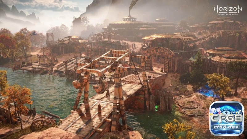 Game Horizon Forbidden West: Cuộc đi săn quái máy khổng lồ Khung cảnh đổ nát của một thành phố ven biển, ánh sáng chiều xuyên qua sương và bụi